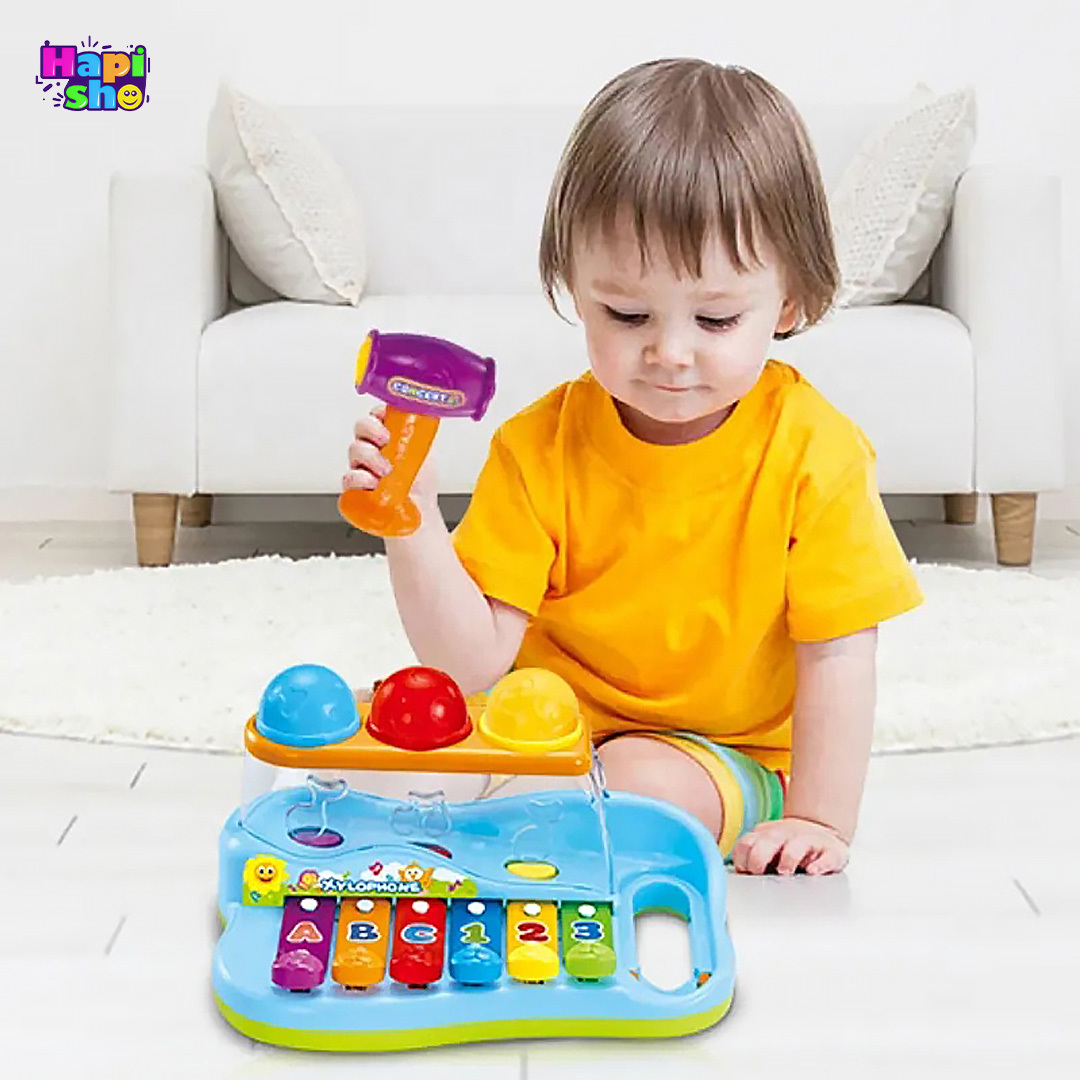  خریداسباب بازی موزیکال چکش و بلز با توپ‌های رنگی هولی تویز Hola Toys–اسباب بازی 